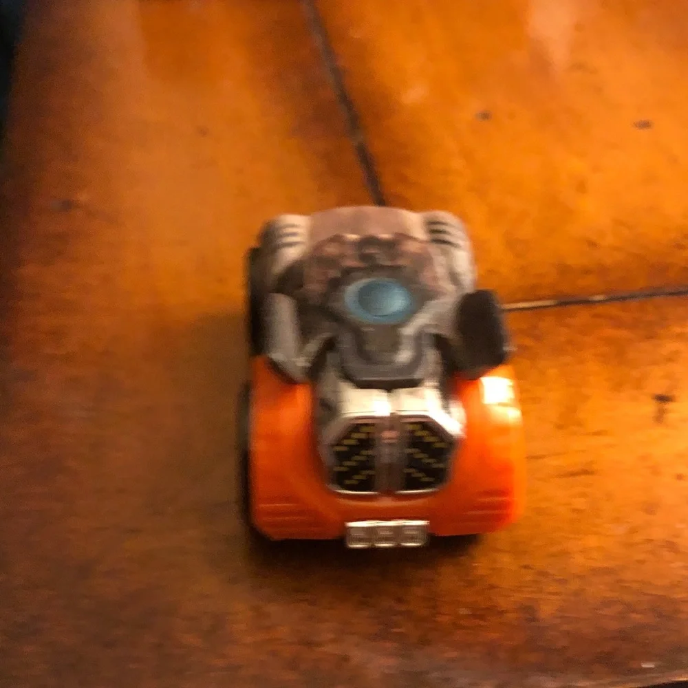 Die-Cast Toy Car in Metallic Brown with Orange Accents